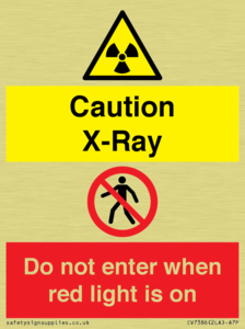 Caution X-Ray. Do not enter when red light is on